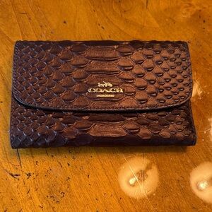 COACH Embossed Leather Wallet in Deep Brown